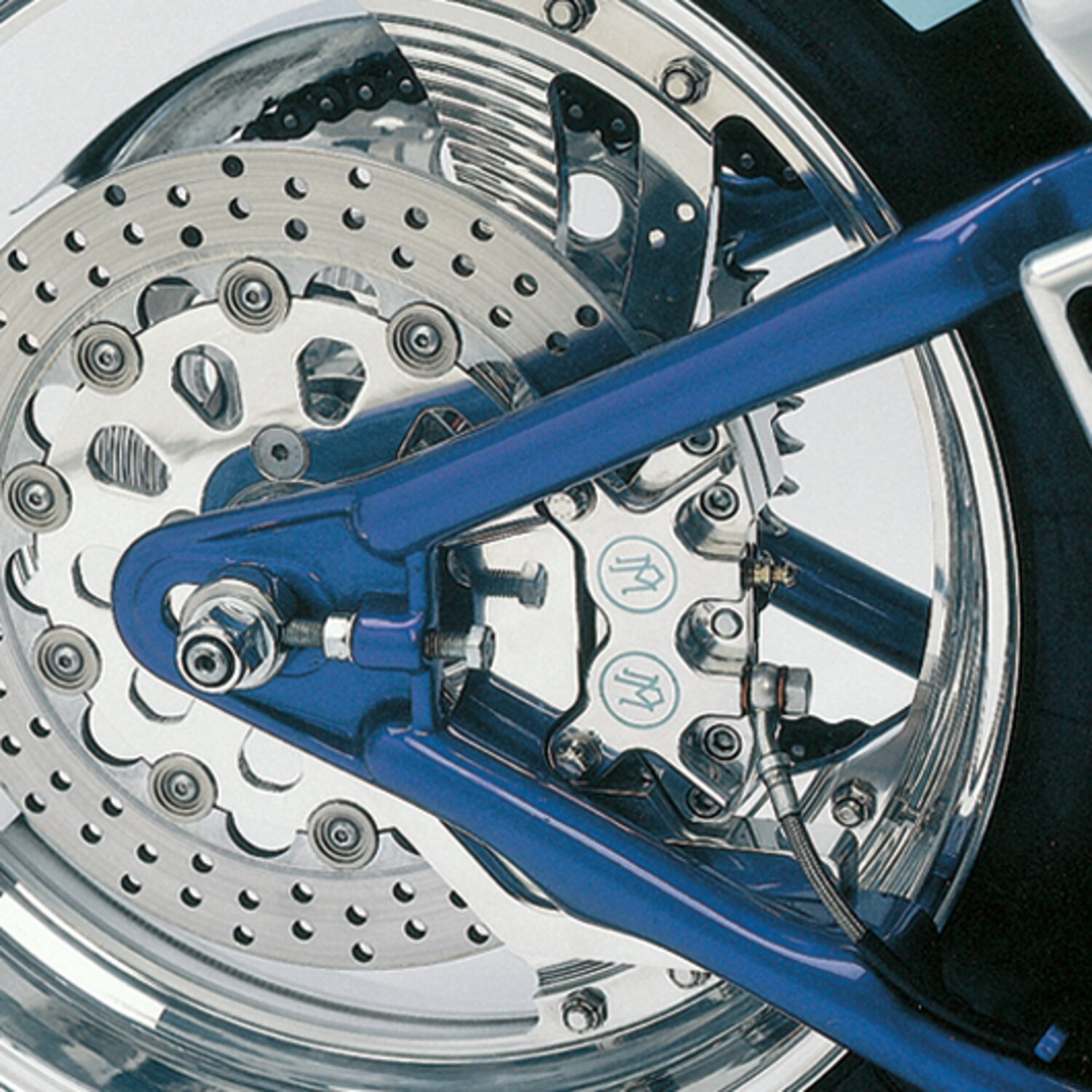PM, Rear caliper bracket, 11.5". Chrome L87-99 Softail (NU)