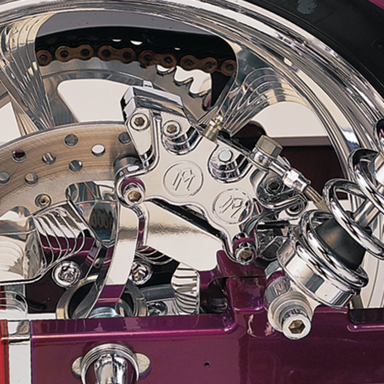 PM, Rear 4-p caliper bracket, 11.5". Chrome 91-99 Dyna (NU)